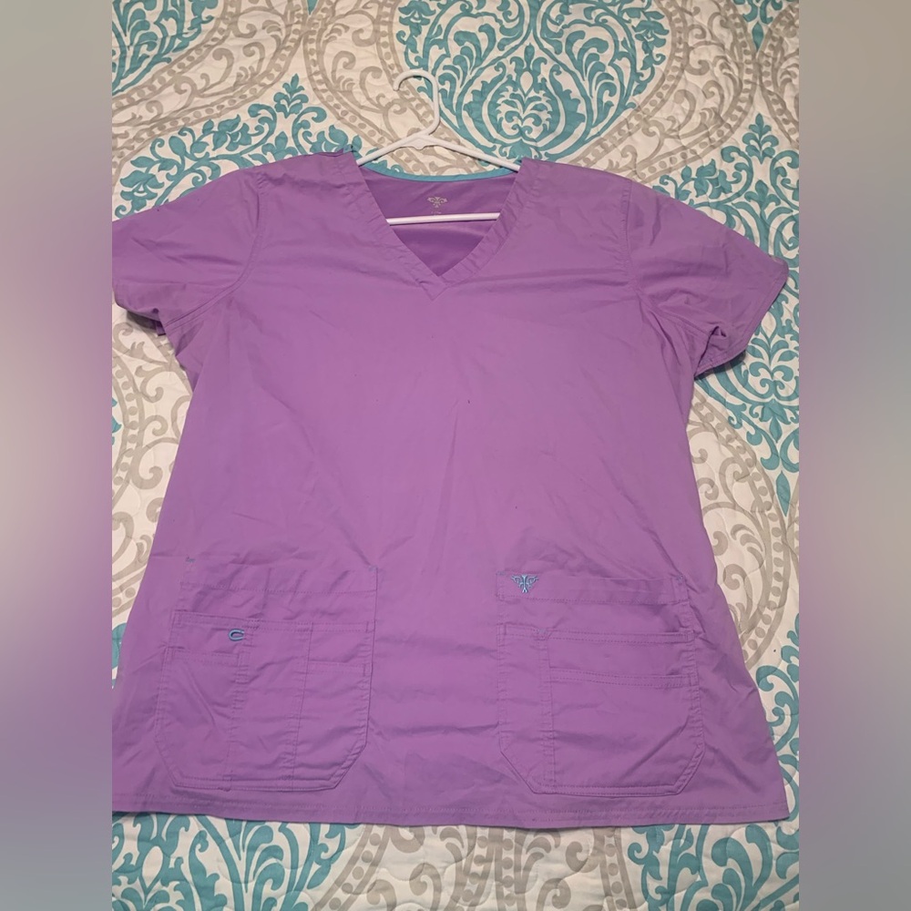 Set of used pastel purple med couture scrubs.
